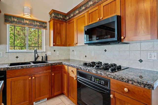 3721 Brandon Way, Missoula, MT 59803 - kitchen featuring black appliances, a sink, tile counters, brown cabinets, and tasteful backsplash