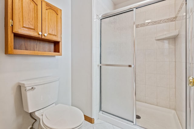 3721 Brandon Way, Missoula, MT 59803 - full bathroom featuring toilet, a shower stall, and tile patterned flooring