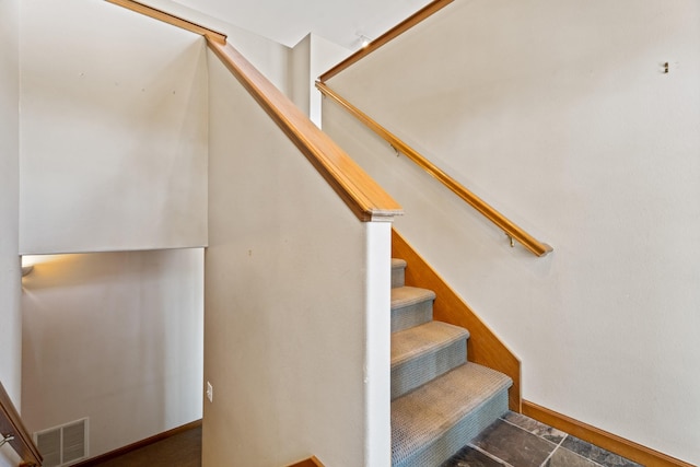 3721 Brandon Way, Missoula, MT 59803 - stairs featuring baseboards and stone finish floors