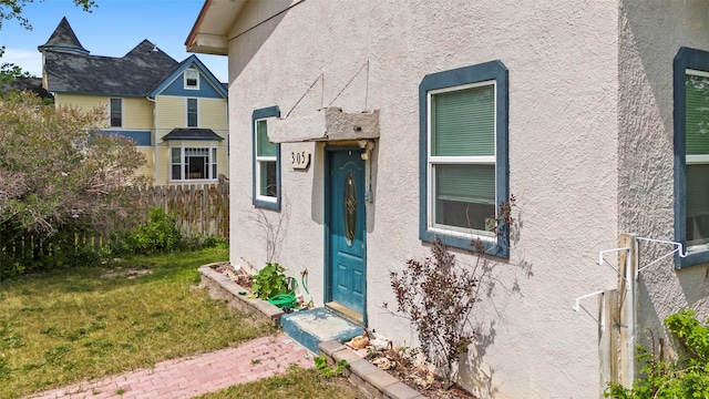 305 S Cedar St, Townsend, MT 59644 - property entrance featuring stucco siding