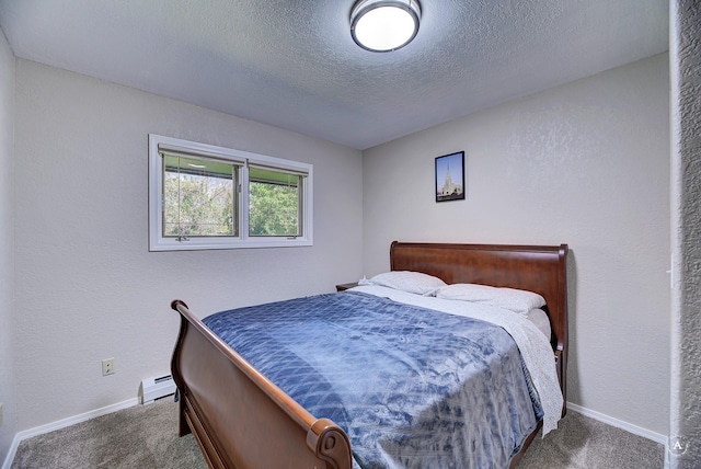 2 N Oregon St, Helena, MT 59601 - carpeted bedroom with a baseboard heating unit, a textured ceiling, and baseboards