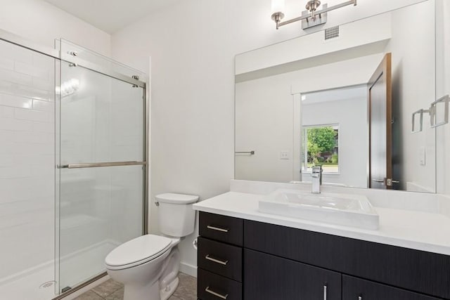 147 Hawthorne Ct Unit B, Whitefish, MT 59937 - full bath with a shower stall, vanity, and tile patterned flooring