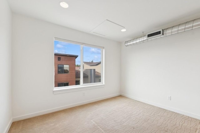 147 Hawthorne Ct Unit B, Whitefish, MT 59937 - carpeted empty room featuring baseboards and recessed lighting