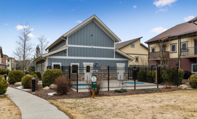 147 Hawthorne Ct Unit B, Whitefish, MT 59937 - back of property with board and batten siding