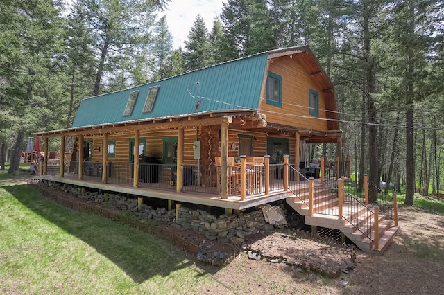 1835 Emmons Canyon Rd, Kila, MT 59920 - back of property featuring a gambrel roof, metal roof, and a lawn