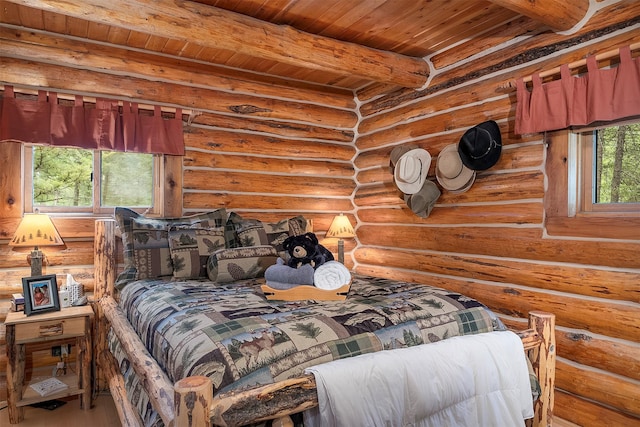 1835 Emmons Canyon Rd, Kila, MT 59920 - bedroom featuring wooden ceiling with exposed beams and rustic walls