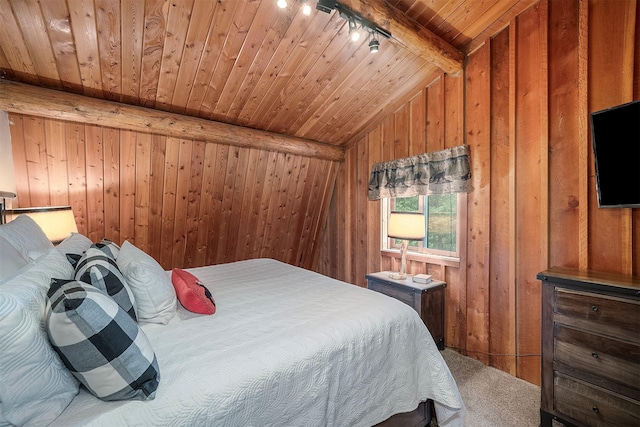 1835 Emmons Canyon Rd, Kila, MT 59920 - bedroom with wooden ceiling, wood walls, carpet flooring, and rail lighting