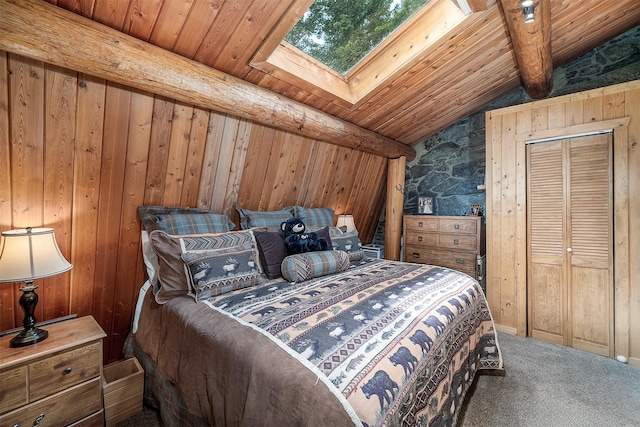 1835 Emmons Canyon Rd, Kila, MT 59920 - bedroom featuring carpet floors, a skylight, lofted ceiling, wood ceiling, and wooden walls