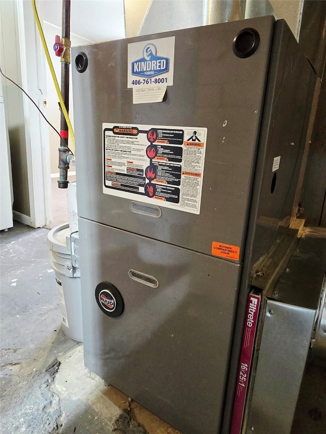 515 7th St N, Great Falls, MT 59401 - utility room with heating unit