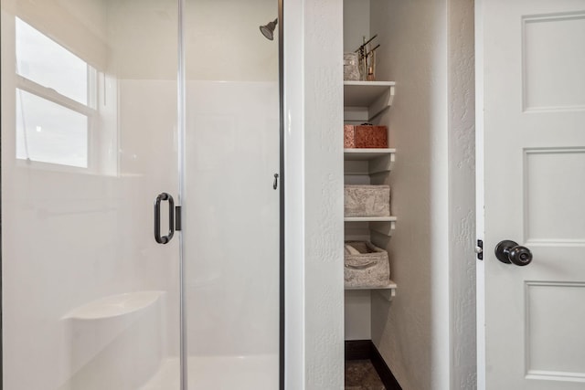 845 Mountain Vista Way, Kalispell, MT 59901 - bathroom with a shower stall and a textured wall