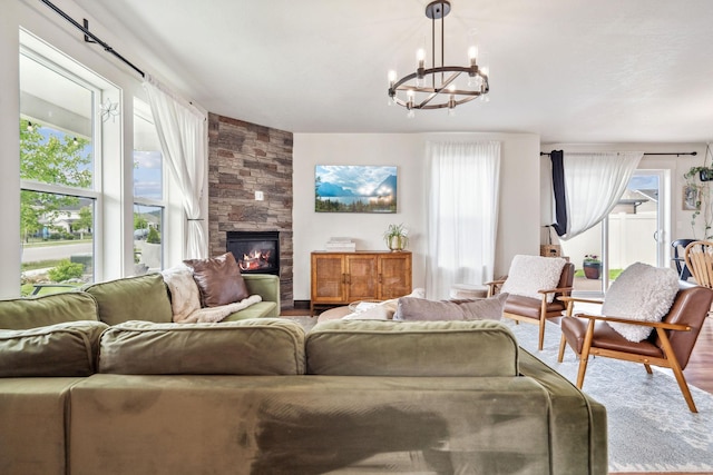 845 Mountain Vista Way, Kalispell, MT 59901 - living area featuring a chandelier and a large fireplace