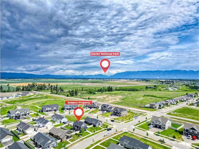 845 Mountain Vista Way, Kalispell, MT 59901 - aerial view of residential area with a mountainous background