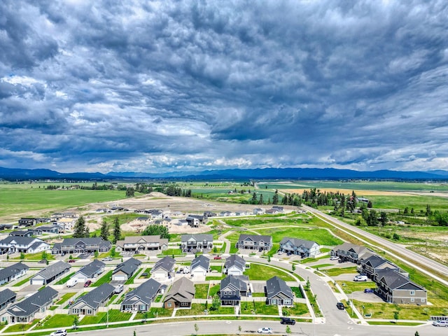 845 Mountain Vista Way, Kalispell, MT 59901 - aerial perspective of suburban area with a mountainous background