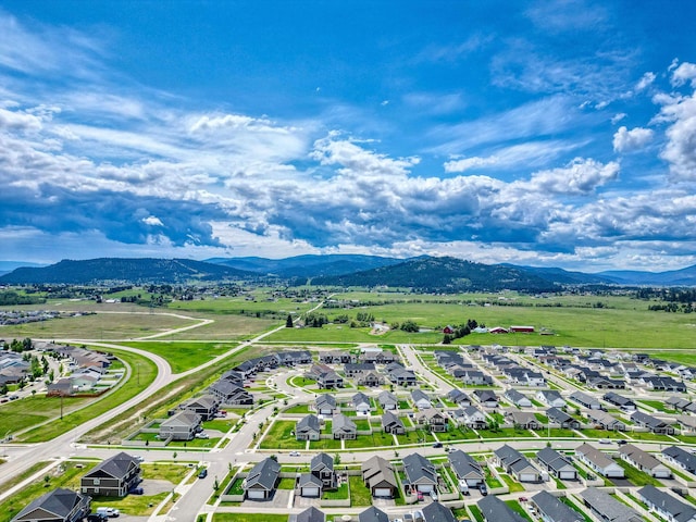 845 Mountain Vista Way, Kalispell, MT 59901 - aerial perspective of suburban area featuring a mountainous background