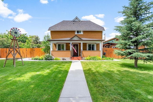 505 N 4th St, Hamilton, MT 59840 - view of front of house with covered porch and a shingled roof