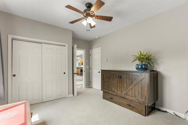505 N 4th St, Hamilton, MT 59840 - bedroom with light carpet, baseboards, a closet, and a ceiling fan