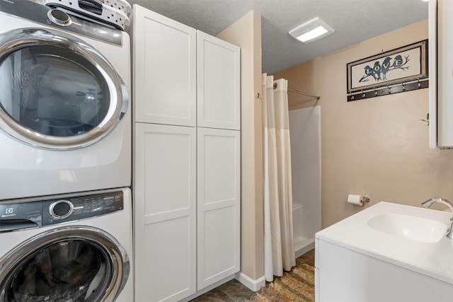 505 N 4th St, Hamilton, MT 59840 - washroom featuring stacked washer / dryer and a sink