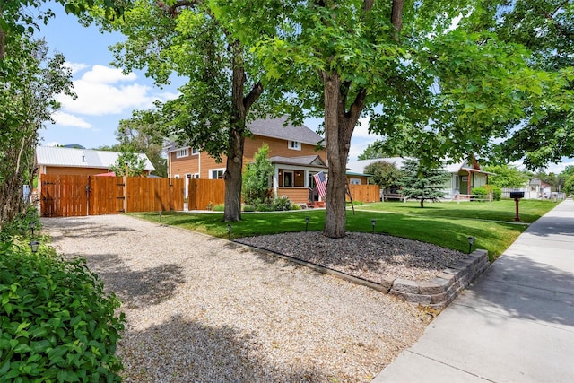 505 N 4th St, Hamilton, MT 59840 - view of front of house featuring a gate