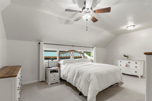 505 N 4th St, Hamilton, MT 59840 - bedroom with light carpet, lofted ceiling, a ceiling fan, and baseboards
