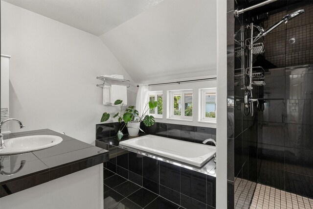 505 N 4th St, Hamilton, MT 59840 - bathroom with a garden tub, a shower stall, vanity, vaulted ceiling, and tile patterned flooring