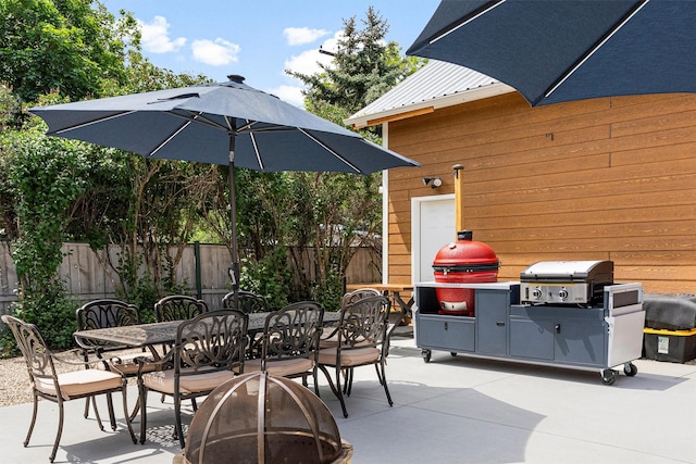 505 N 4th St, Hamilton, MT 59840 - view of patio / terrace featuring outdoor dining area and a grill