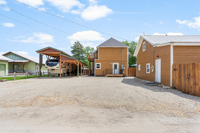 505 N 4th St, Hamilton, MT 59840 - exterior space featuring driveway and a carport