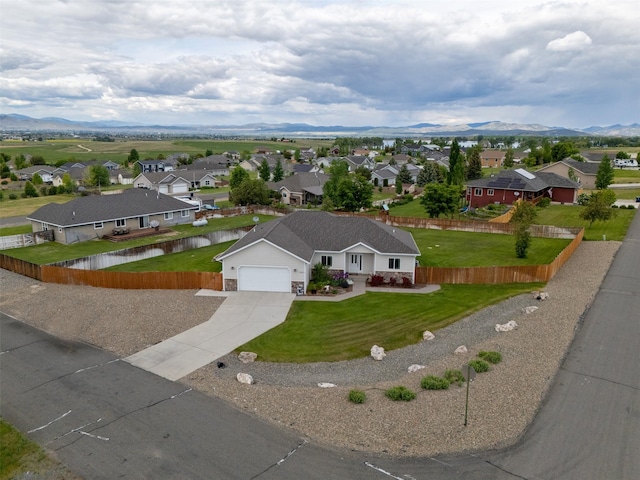 4288 Iverson Rd, Helena, MT 59602 - aerial perspective of suburban area with a water and mountain view