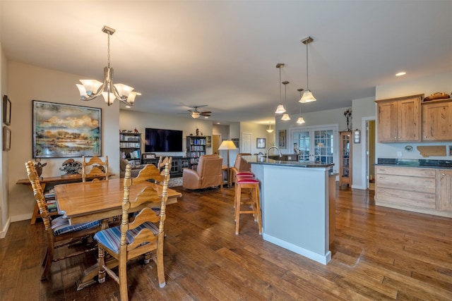 4288 Iverson Rd, Helena, MT 59602 - dining space with a chandelier, ceiling fan, dark wood-style floors, and recessed lighting