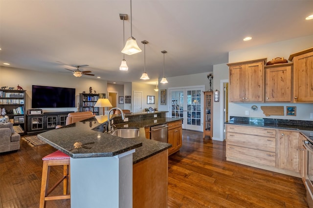 4288 Iverson Rd, Helena, MT 59602 - kitchen featuring a sink, dishwasher, open floor plan, french doors, and dark wood-type flooring