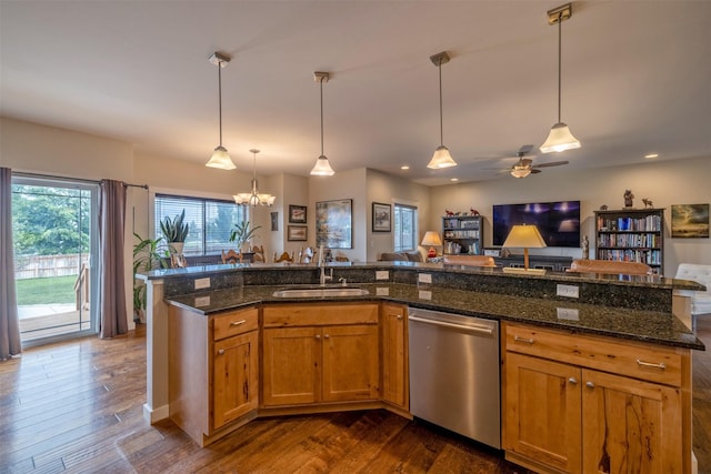 4288 Iverson Rd, Helena, MT 59602 - kitchen featuring dishwasher, open floor plan, dark wood finished floors, a sink, and recessed lighting