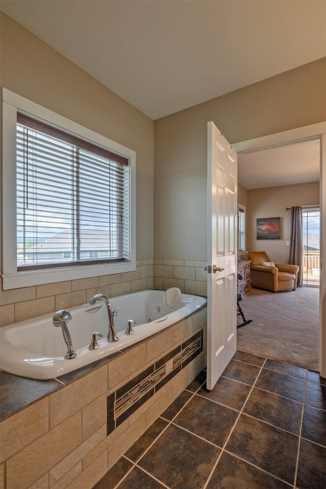 4288 Iverson Rd, Helena, MT 59602 - full bathroom with a tub with jets and tile patterned flooring