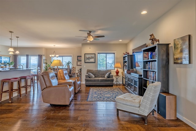 4288 Iverson Rd, Helena, MT 59602 - living room with a ceiling fan, dark wood finished floors, recessed lighting, a chandelier, and baseboards