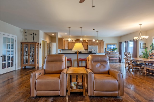 4288 Iverson Rd, Helena, MT 59602 - living area with dark wood finished floors, a chandelier, recessed lighting, and ceiling fan
