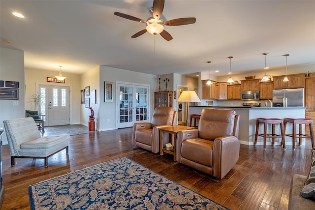 4288 Iverson Rd, Helena, MT 59602 - living room featuring dark wood-style floors, baseboards, ceiling fan, and recessed lighting