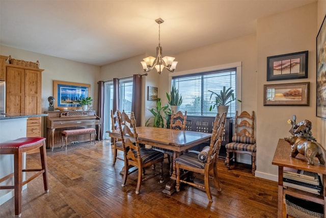 4288 Iverson Rd, Helena, MT 59602 - dining room featuring a chandelier and dark wood-style floors