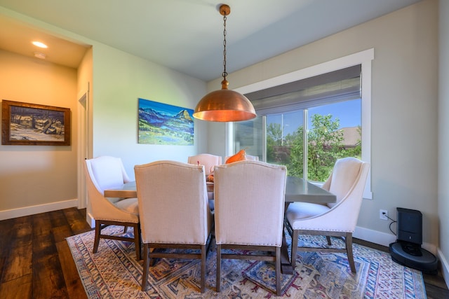 135 E Swift Creek Way, Kalispell, MT 59901 - dining space featuring baseboards and wood finished floors