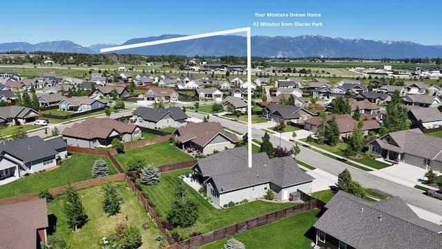 135 E Swift Creek Way, Kalispell, MT 59901 - aerial perspective of suburban area featuring a mountain backdrop