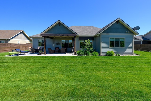 135 E Swift Creek Way, Kalispell, MT 59901 - rear view of property with a patio area, roof with shingles, and an outdoor living space