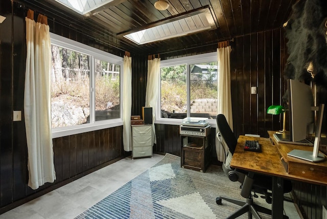 343 Deer Trl, Whitefish, MT 59937 - home office featuring a skylight, wood walls, and wood ceiling