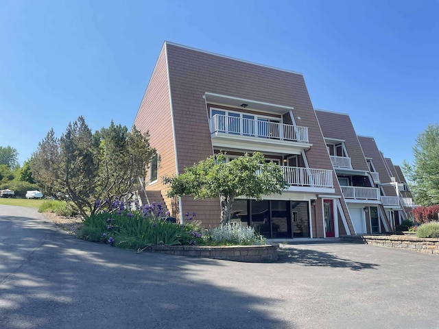 12 Country Club Dr Unit 16, Polson, MT 59860 - view of building exterior featuring driveway