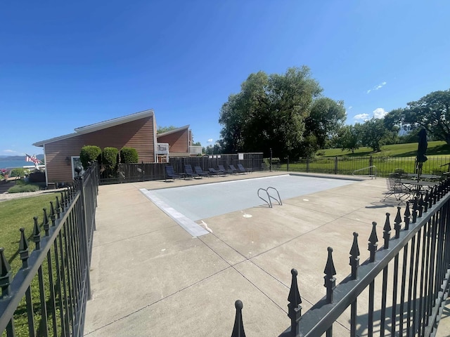 12 Country Club Dr Unit 16, Polson, MT 59860 - view of swimming pool with a patio