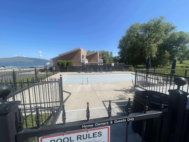 12 Country Club Dr Unit 16, Polson, MT 59860 - view of pool featuring a water view