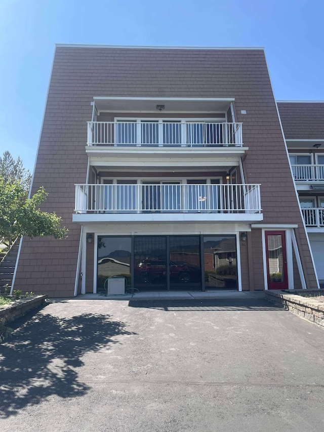 12 Country Club Dr Unit 16, Polson, MT 59860 - view of building exterior featuring driveway