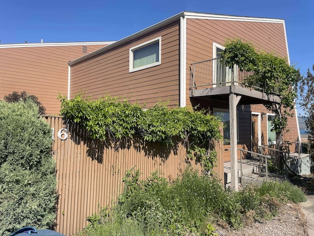12 Country Club Dr Unit 16, Polson, MT 59860 - view of property exterior with a balcony