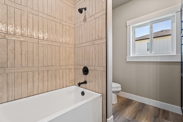 4337 Christian Dr, Missoula, MT 59803 - full bath with baseboards, toilet, wood finished floors, and shower / bath combination