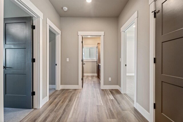 4337 Christian Dr, Missoula, MT 59803 - hallway with light wood-style floors and baseboards