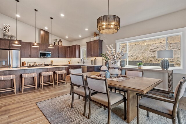 4337 Christian Dr, Missoula, MT 59803 - dining room with light wood finished floors, recessed lighting, and high vaulted ceiling