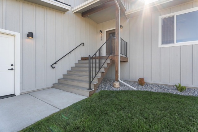 4337 Christian Dr, Missoula, MT 59803 - property entrance with a yard and board and batten siding