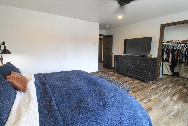 220 Columbia Meadows Dr, Columbia Falls, MT 59912 - bedroom with wood finished floors, a closet, recessed lighting, and a spacious closet