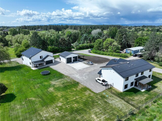 224 Columbia Meadows Dr, Columbia Falls, MT 59912 - view from above of property with a heavily wooded area